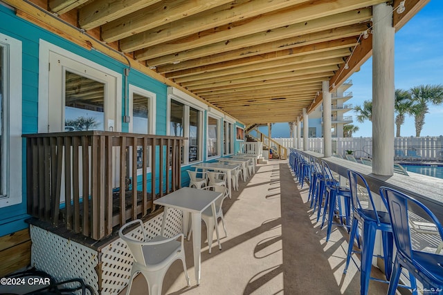 view of patio / terrace with a water view