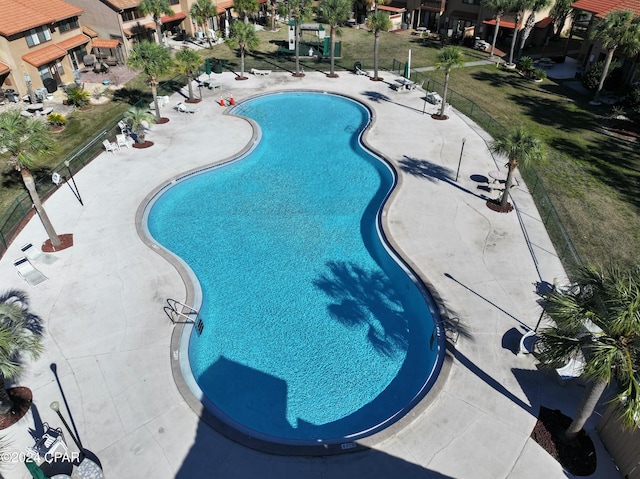 view of swimming pool featuring a patio area