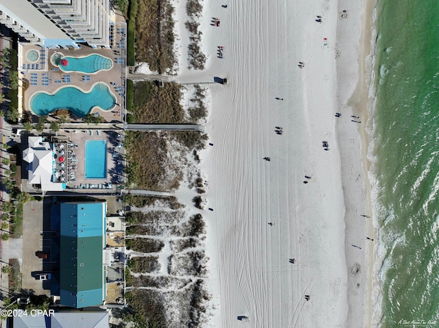 drone / aerial view with a water view and a view of the beach