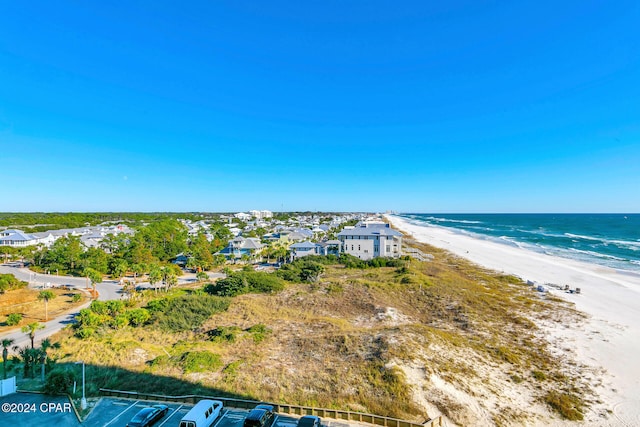 drone / aerial view featuring a view of the beach and a water view