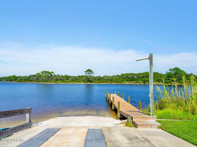 23223 Front Beach Rd Unit 713, Panama City Beach, FL 32413 - dock featuring a boat ramp and a water view