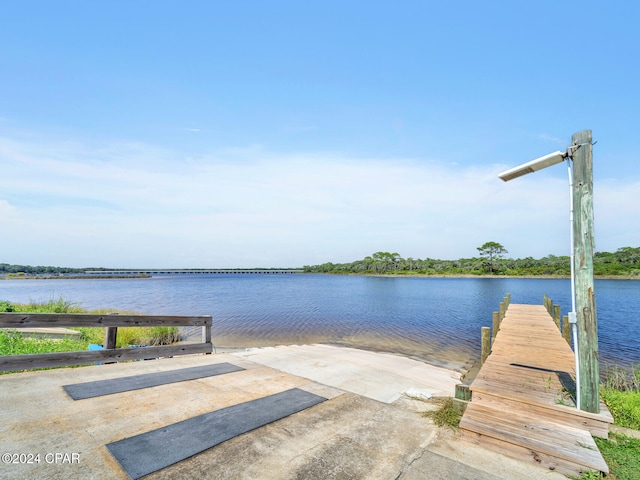 dock area featuring a water view