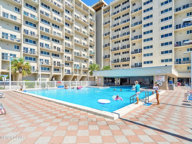 view of pool with fence