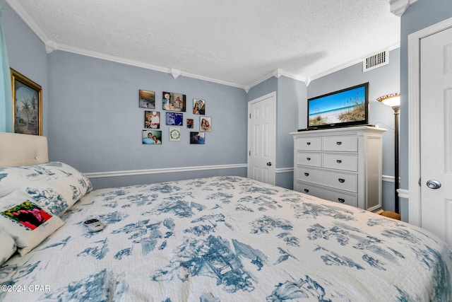 23223 Front Beach Rd Unit 713, Panama City Beach, FL 32413 - bedroom with crown molding and a textured ceiling