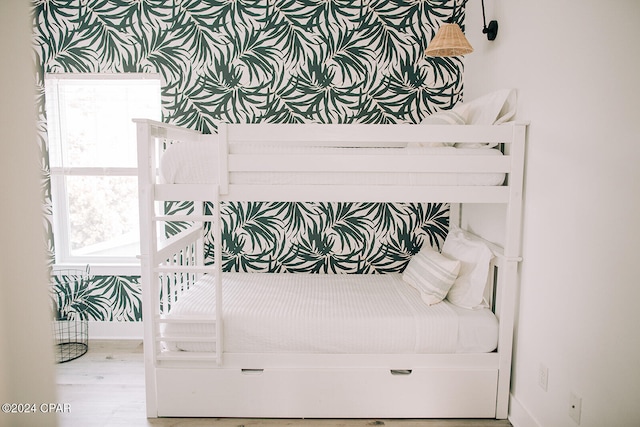 bedroom with hardwood / wood-style flooring