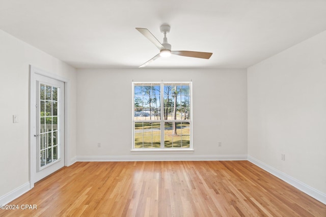 unfurnished room featuring ceiling fan and light hardwood / wood-style flooring