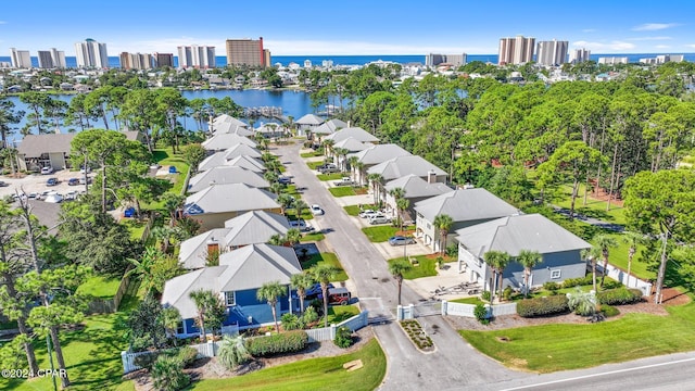 birds eye view of property featuring a water view