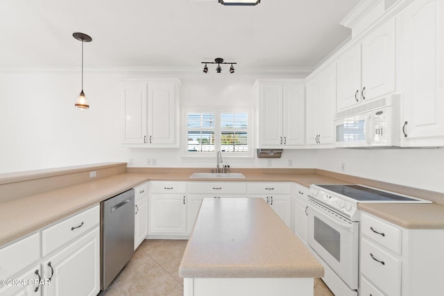 kitchen featuring white cabinets, white appliances, and sink