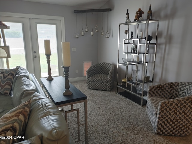 living room with carpet floors and french doors