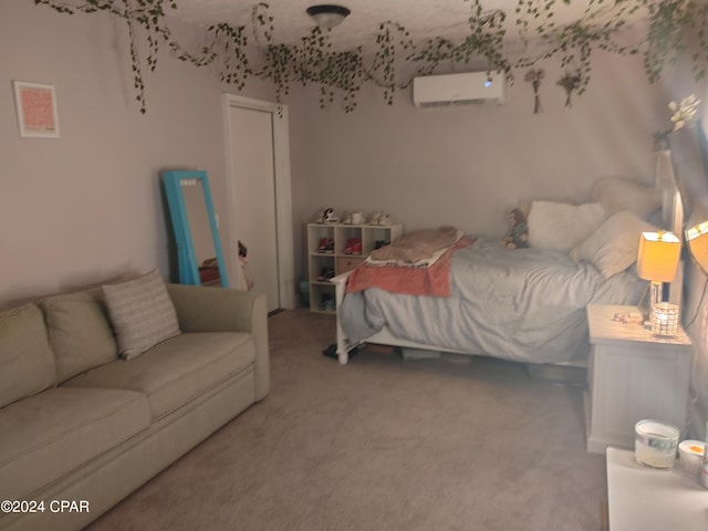 carpeted bedroom with a wall mounted air conditioner