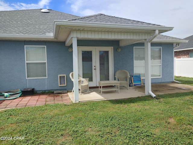 3707 Bay Tree Rd, Lynn Haven, FL 32444 - rear view of house featuring french doors, a patio, a shingled roof, and stucco siding