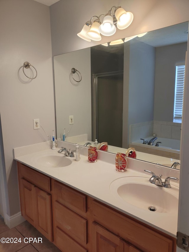 bathroom featuring tile patterned floors, separate shower and tub, and vanity