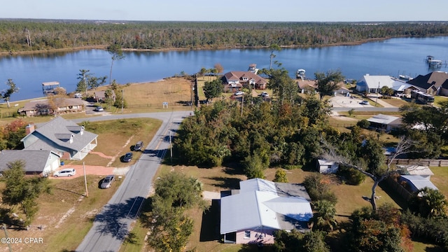 birds eye view of property featuring a water view