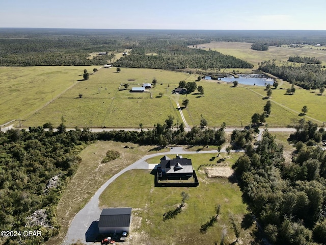 aerial view featuring a rural view and a water view