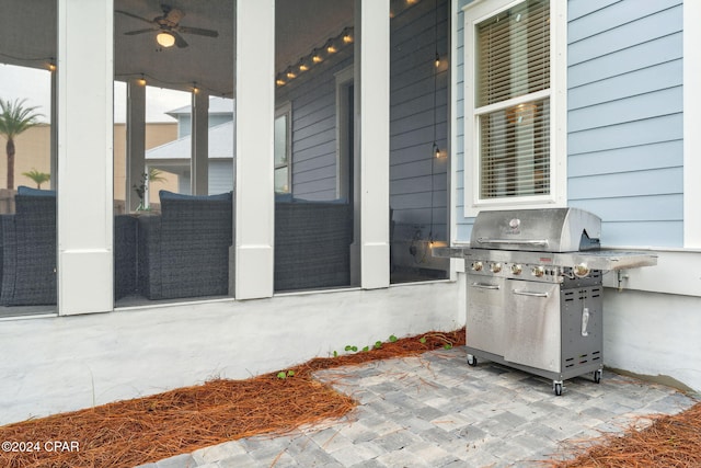 view of patio / terrace featuring ceiling fan and a grill