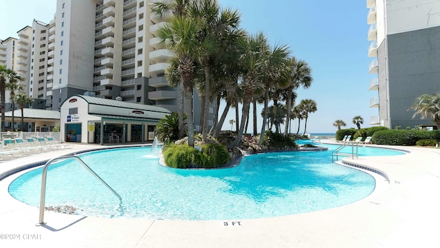 view of pool featuring pool water feature