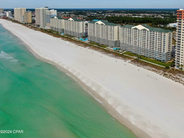 aerial view with a view of the beach and a water view