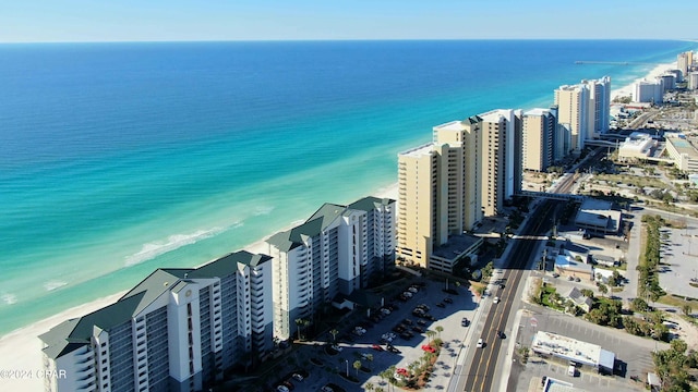 bird's eye view featuring a beach view and a water view