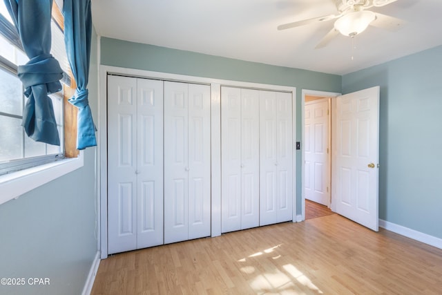 unfurnished bedroom with light hardwood / wood-style flooring and ceiling fan