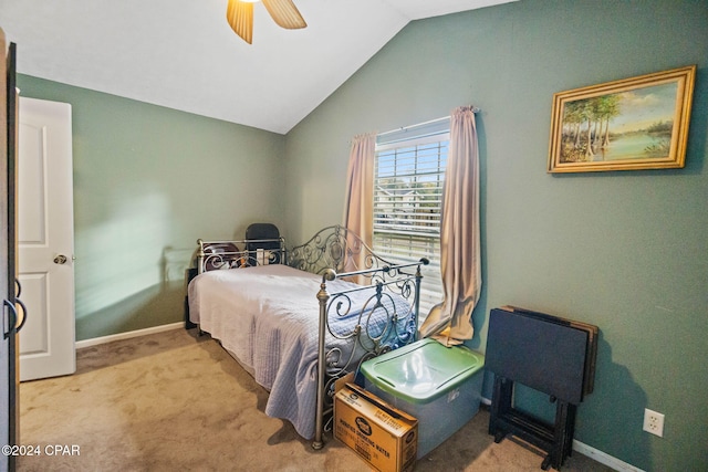 bedroom with light carpet, ceiling fan, and lofted ceiling