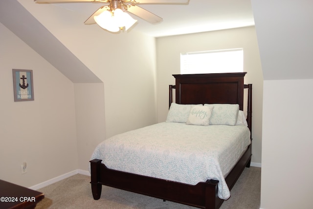 bedroom with ceiling fan and light carpet