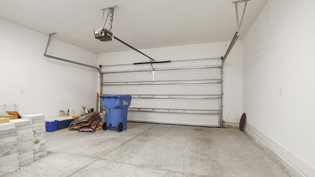 garage featuring a garage door opener