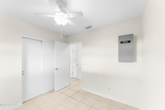 unfurnished bedroom with a closet and ceiling fan