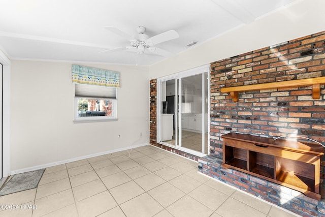 unfurnished living room with light tile patterned flooring, ceiling fan, and ornamental molding