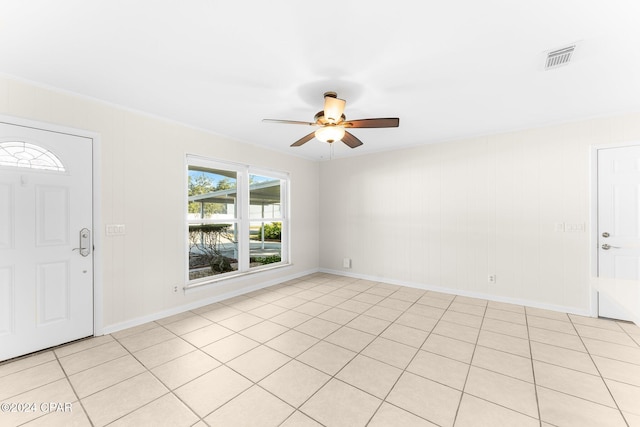 entrance foyer with ceiling fan