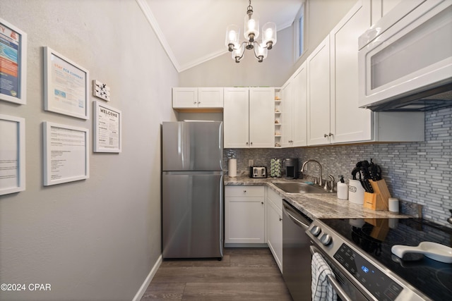 kitchen featuring white cabinets, stainless steel appliances, and sink