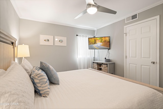 bedroom featuring crown molding and ceiling fan