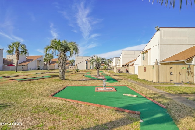 view of community featuring a yard