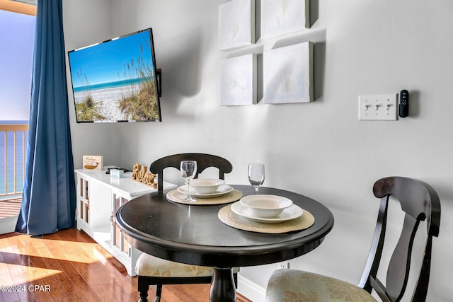 dining area with light hardwood / wood-style flooring