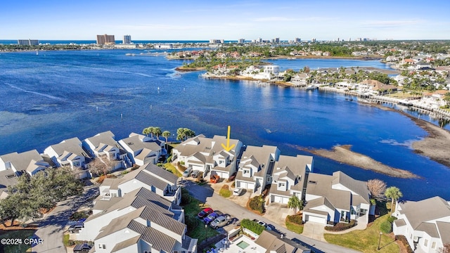 drone / aerial view with a water view