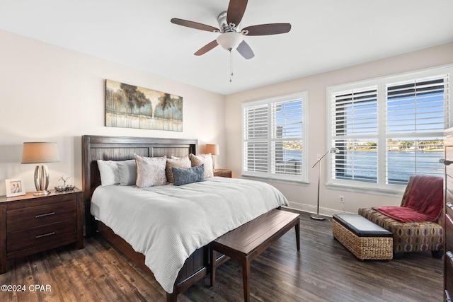 bedroom featuring ceiling fan and dark hardwood / wood-style flooring