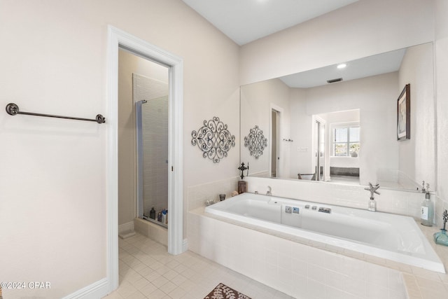 bathroom with plus walk in shower and tile patterned floors