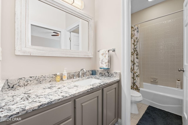 full bathroom featuring shower / bath combo, vanity, tile patterned floors, and toilet