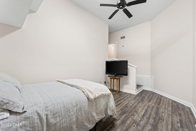 bedroom with dark wood-type flooring and ceiling fan