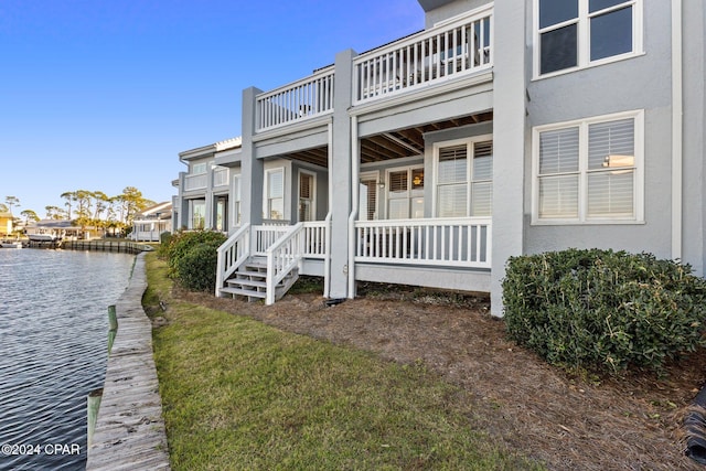 view of home's exterior featuring a water view