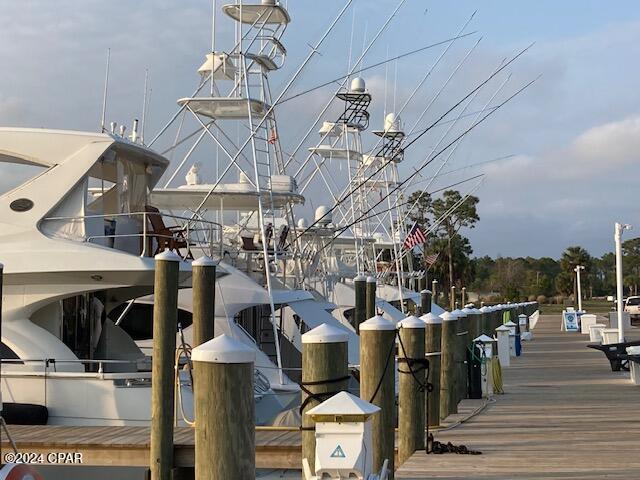 view of community with a dock