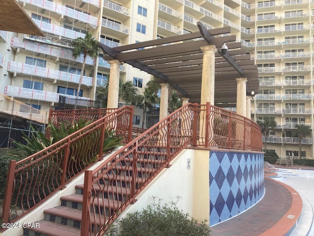 view of property's community with a pergola