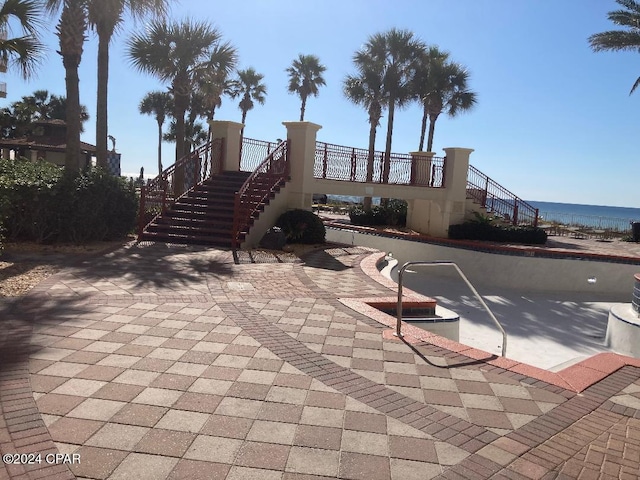 view of patio / terrace featuring a water view