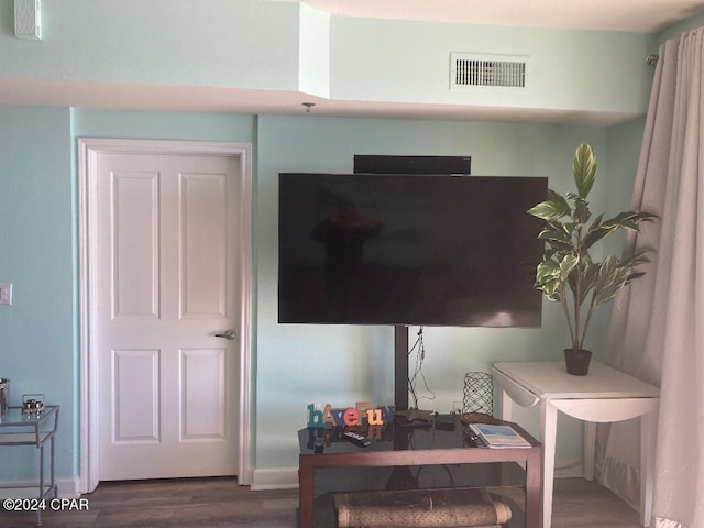 interior details featuring hardwood / wood-style flooring