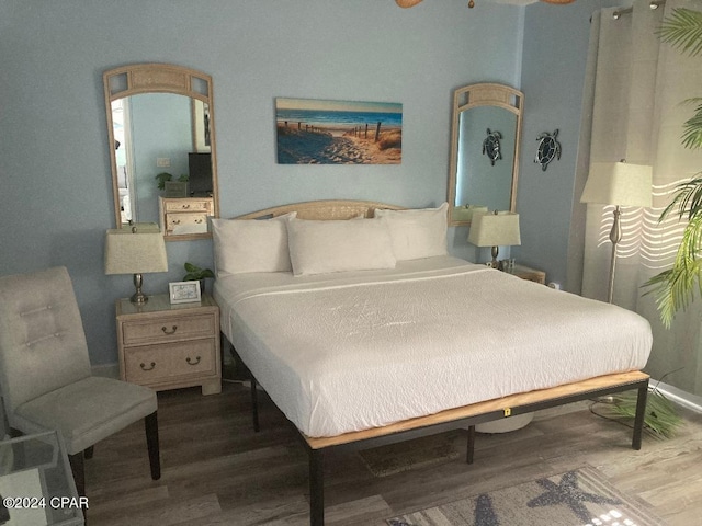 bedroom featuring wood-type flooring