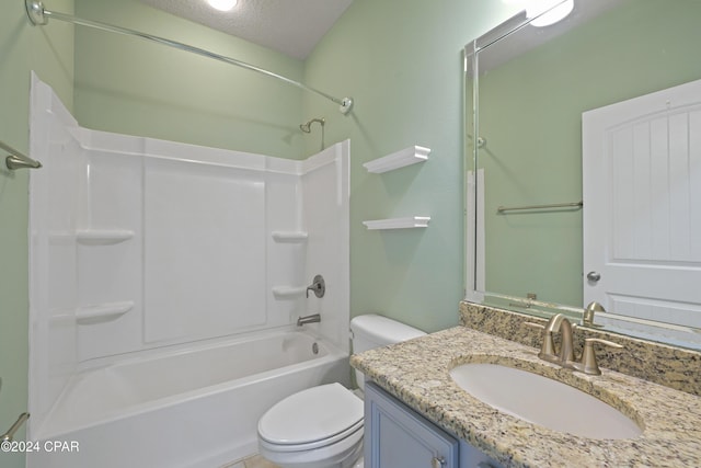 full bathroom with vanity, toilet, shower / bath combination, and a textured ceiling