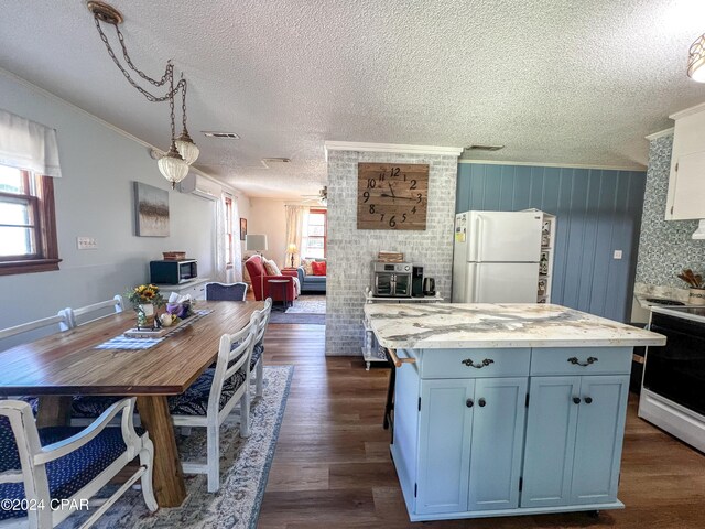 kitchen with white cabinetry, electric range, dark hardwood / wood-style floors, white refrigerator, and ornamental molding