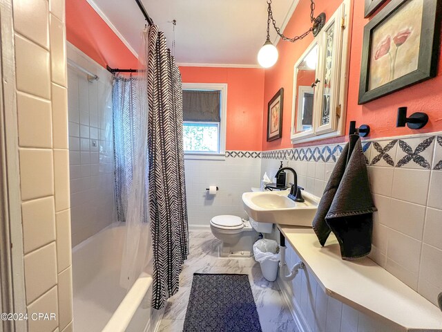 bathroom featuring shower / tub combo with curtain, ornamental molding, toilet, and tile walls