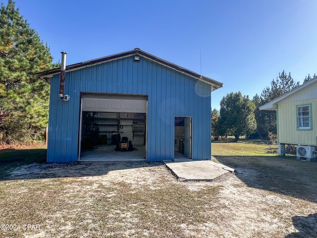 garage featuring ac unit