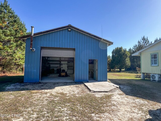 garage featuring ac unit