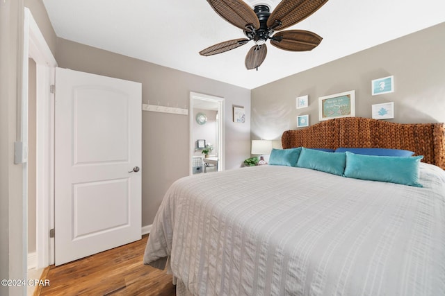 bedroom with light hardwood / wood-style floors and ceiling fan